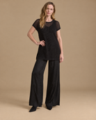 Velo + Deriva RAIZO, blusa Velo negra con pantalón Deriva negro